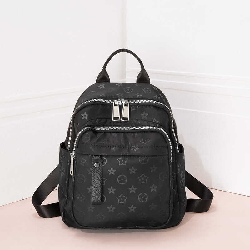 高级感牛津布双肩背包女2024新款时尚书包轻便印花防水旅行包包潮