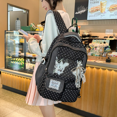 日系痛包女生校园减负护脊双肩包