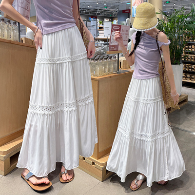 镂空设计花边A字半身裙2026夏季新款简约白色垂感大摆蛋糕中长裙