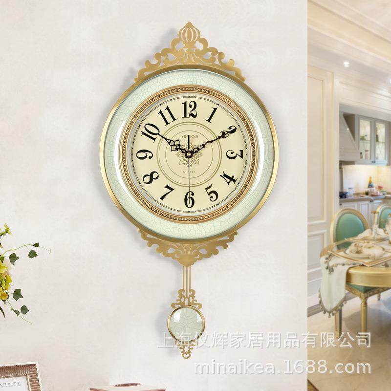 欧式客厅家用创意挂钟摇摆时尚钟表个性挂表静音金属装饰时钟