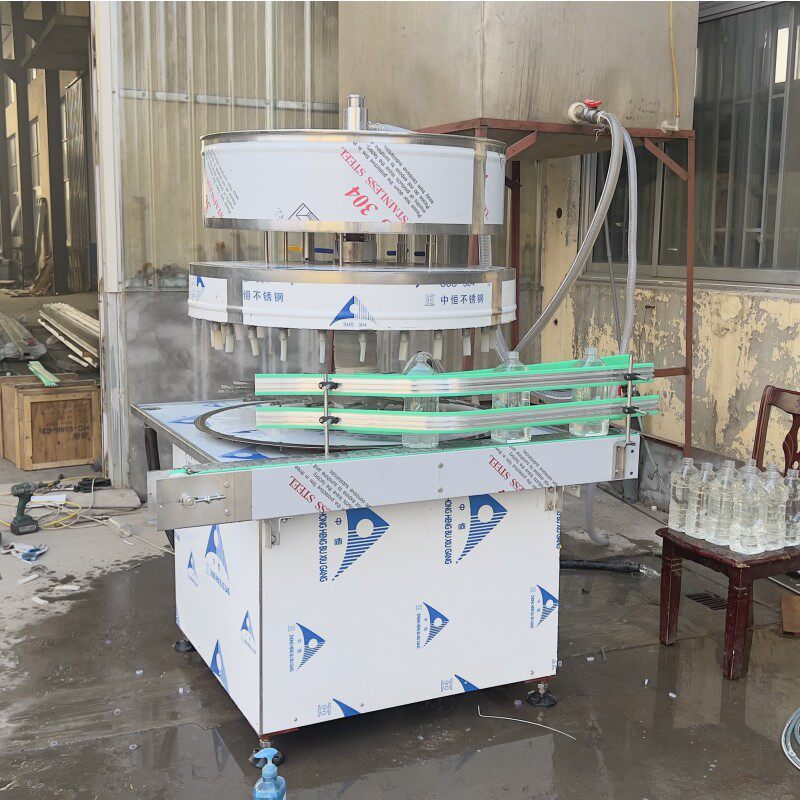 12头小型白酒液体半自动定量灌装机械电动饮料矿泉水罐装设备