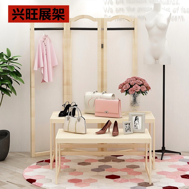 服装店橱窗展示桌童装店铺高低流水台木质中岛展示台中间货架简约