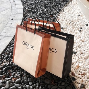 竖版无纺c布高档服装店手提袋大号装衣服袋子外出时尚购物袋定制