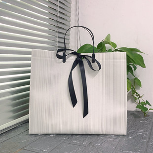 素色無(wú)紡布禮品袋叉耳絲帶手提袋覆膜服裝 袋化P妝品加厚購(gòu)物袋定