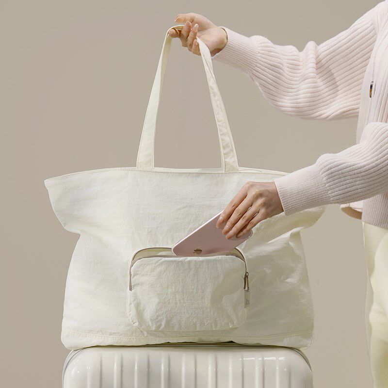 旅行衣物收纳袋可折叠大容量防水手提单肩包可套拉杆箱轻奢学院风