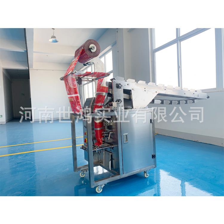 米粉凉粉湿面条人工投料链斗包装机五金件棉球碘伏长尾包装机