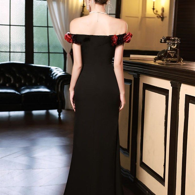 黑色年会晚礼服2024新款一字肩高端气质名媛主持人鱼尾裙高级感女