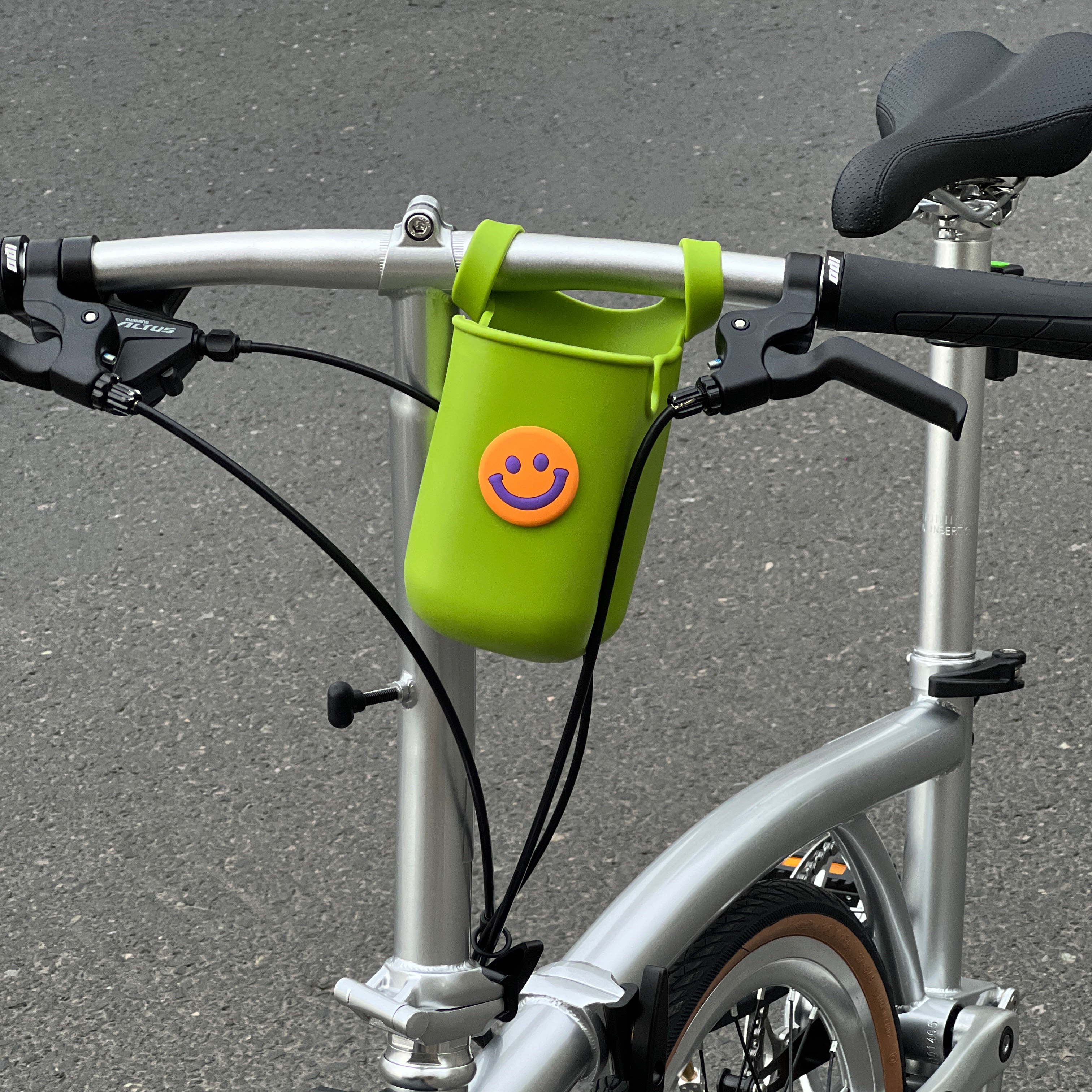 奔萌笑脸公路自行车骑行水杯壶套架配件电动车挂包婴儿推车小配饰