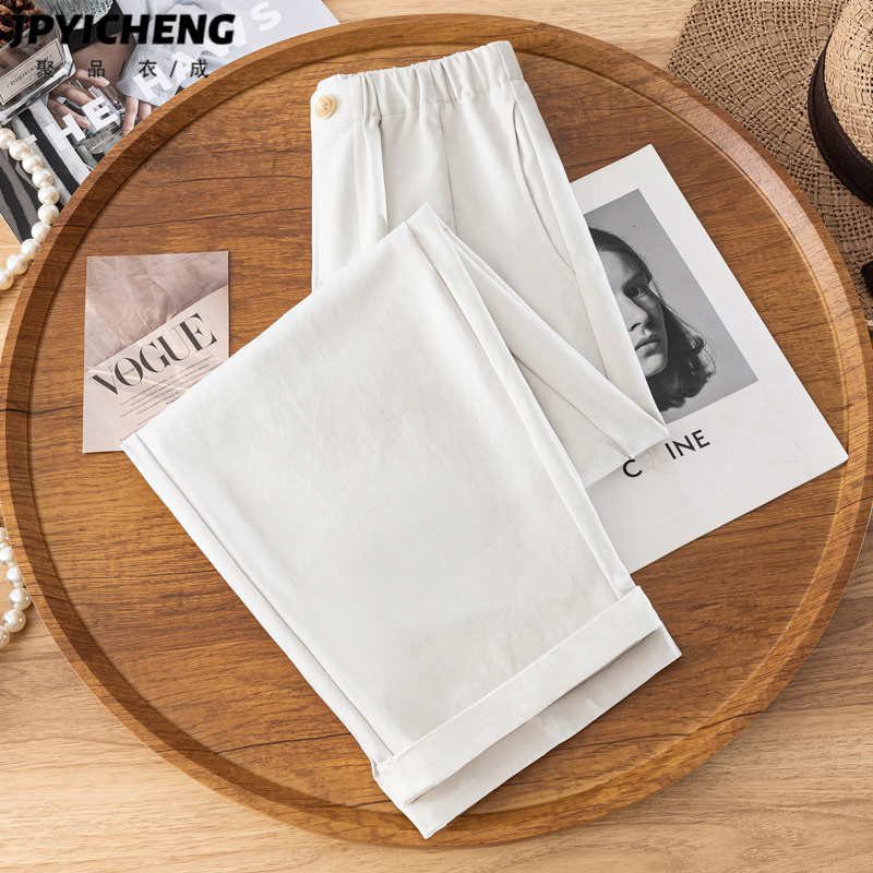 杏色弯刀九分裤卷边设计感女2025年秋季新款直筒高腰休闲阔腿裤子