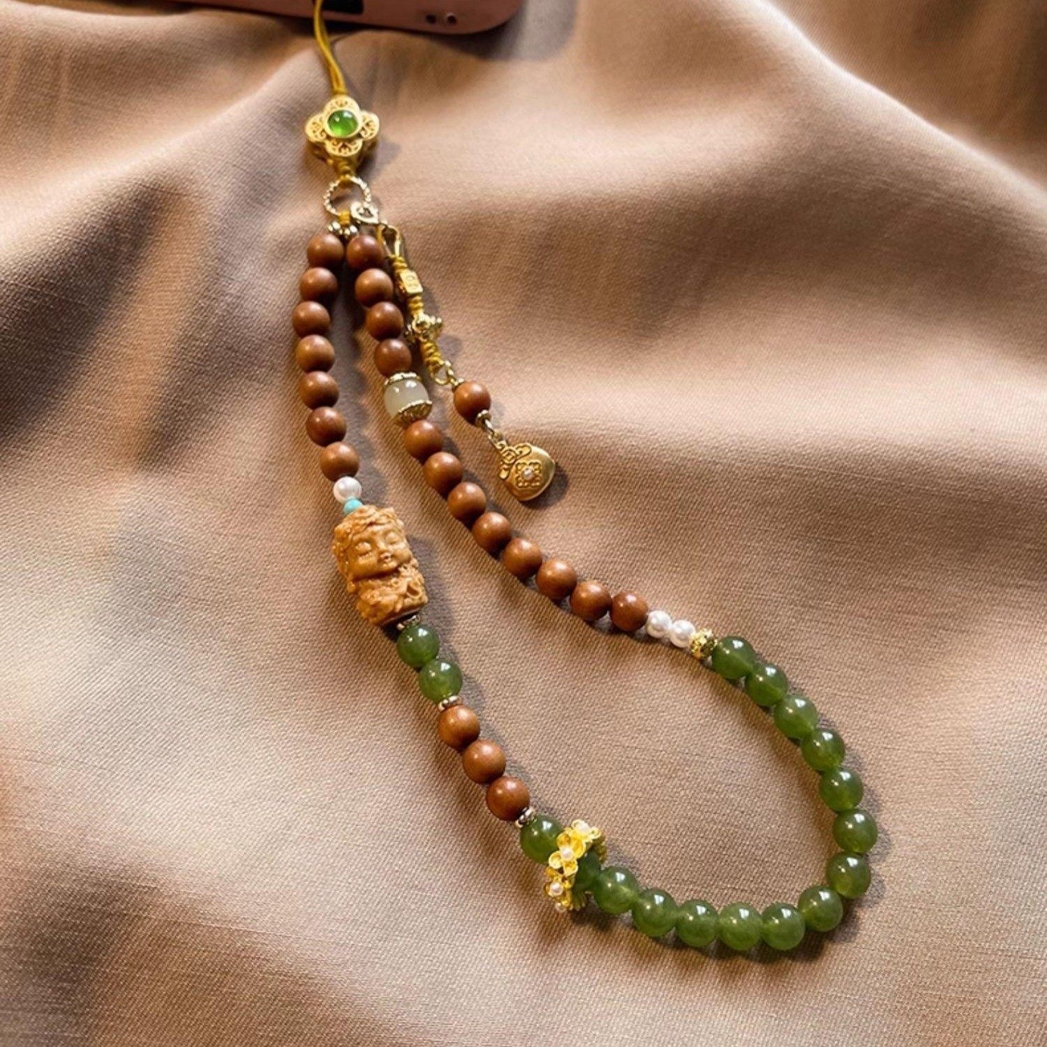 芭比檀木精致手机链新中式玉髓檀香木手机挂件福袋手腕款防丢挂饰