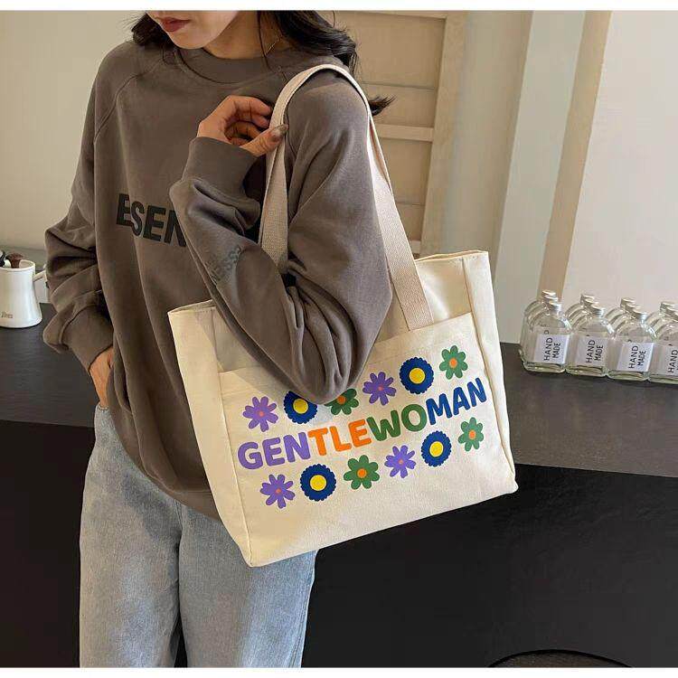 帆布包包女2024新款大容量通勤手提袋简约学生百搭上课单肩托特包