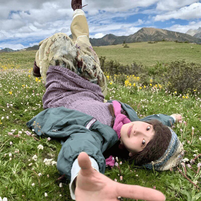 禾木伊犁草原户外出行度假彩色堆堆帽子女皮标拼接包头针织冷帽子