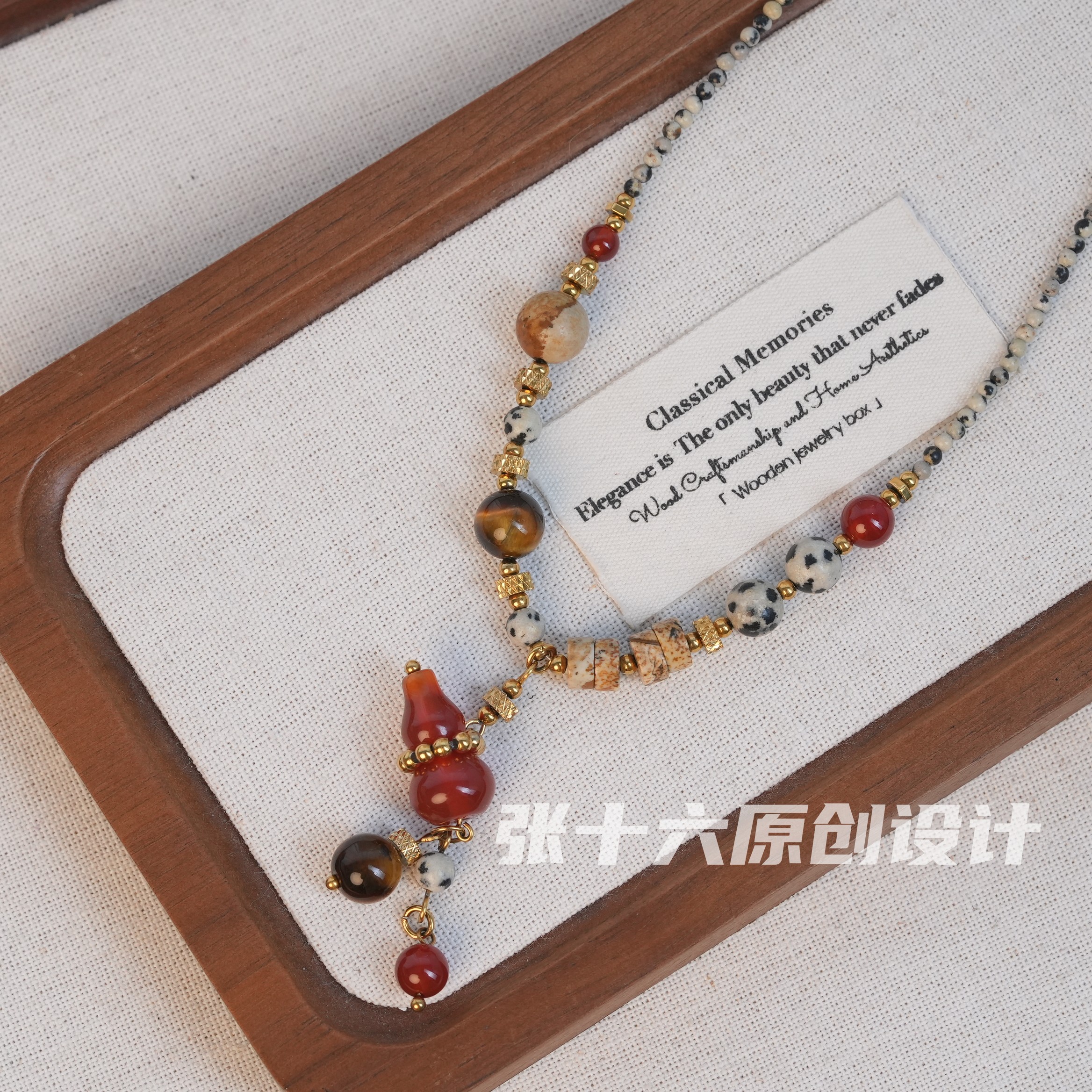 张十六红葫芦钛钢项链