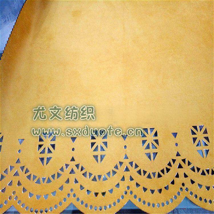 柯桥面料市场全涤弹力麂皮绒激光冲孔烫金花边时尚连衣裙用料