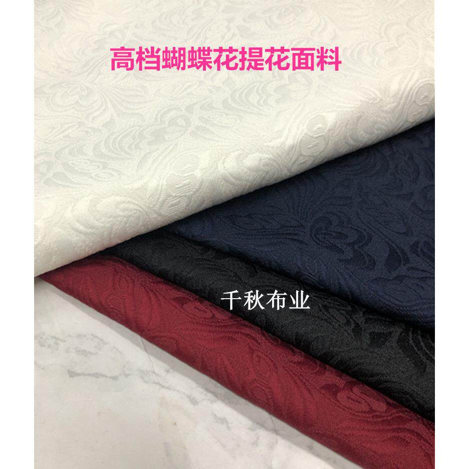 黑色本白色涤棉提花蝴蝶花布料春秋时尚浮雕立体凸面花纹重磅面料