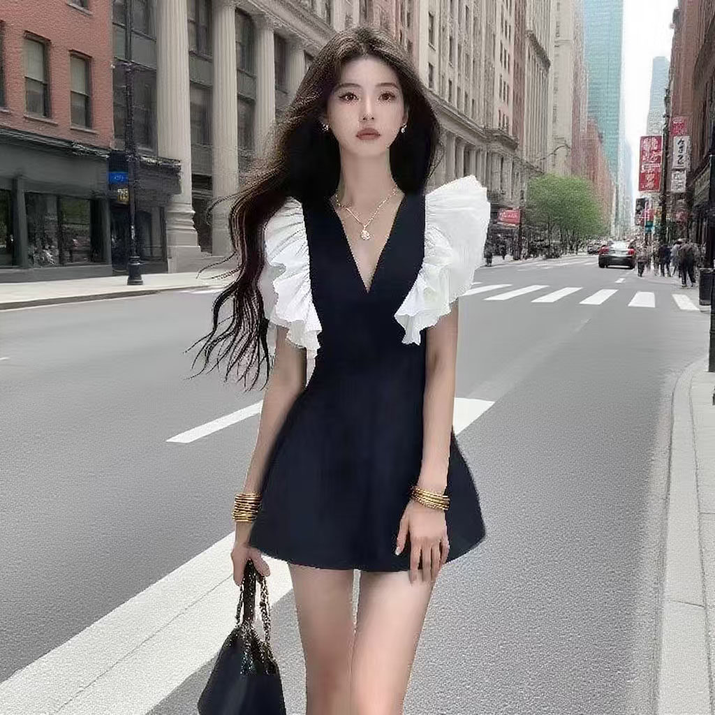 法式复古爱心度假连衣裙女2025年夏季新款收腰显瘦小飞袖短款裙子