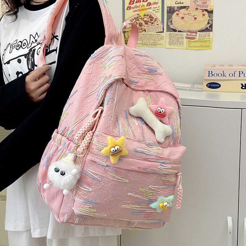 新款书包高中简约轻便双肩包女高级感双肩背包大容量休闲包小众男