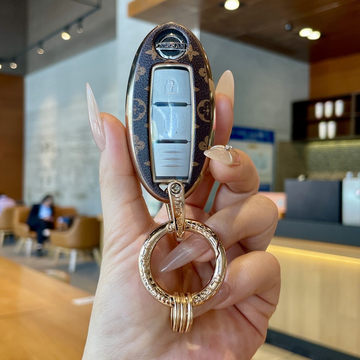 适用日产经典轩逸钥匙套逍客骐达奇骏专用劲客楼兰新途达女包扣壳