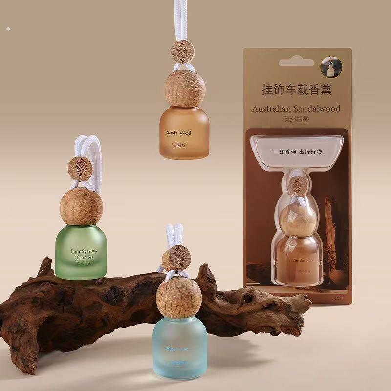 2026新款车载吊瓶实木瓶盖卧室衣柜汽车内挂式香薰饰品持久留香
