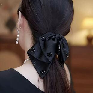 高级感星空缎面低马尾蝴蝶结抓夹女2025新款轻奢风后脑勺发夹头饰