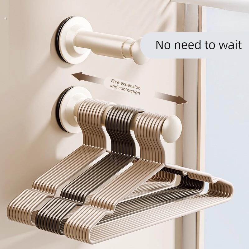 吸盘衣架收纳神器家用阳台多功能伸缩免打孔无痕挂衣架子墙上壁挂