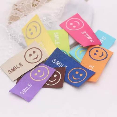 彩色笑脸织唛布艺标签背标diy发绳皮筋贴标发夹头饰装饰材料配件
