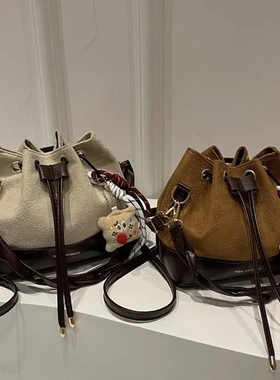 女包2025新款洋气百搭麻花手提水桶包通勤时尚复古斜挎包