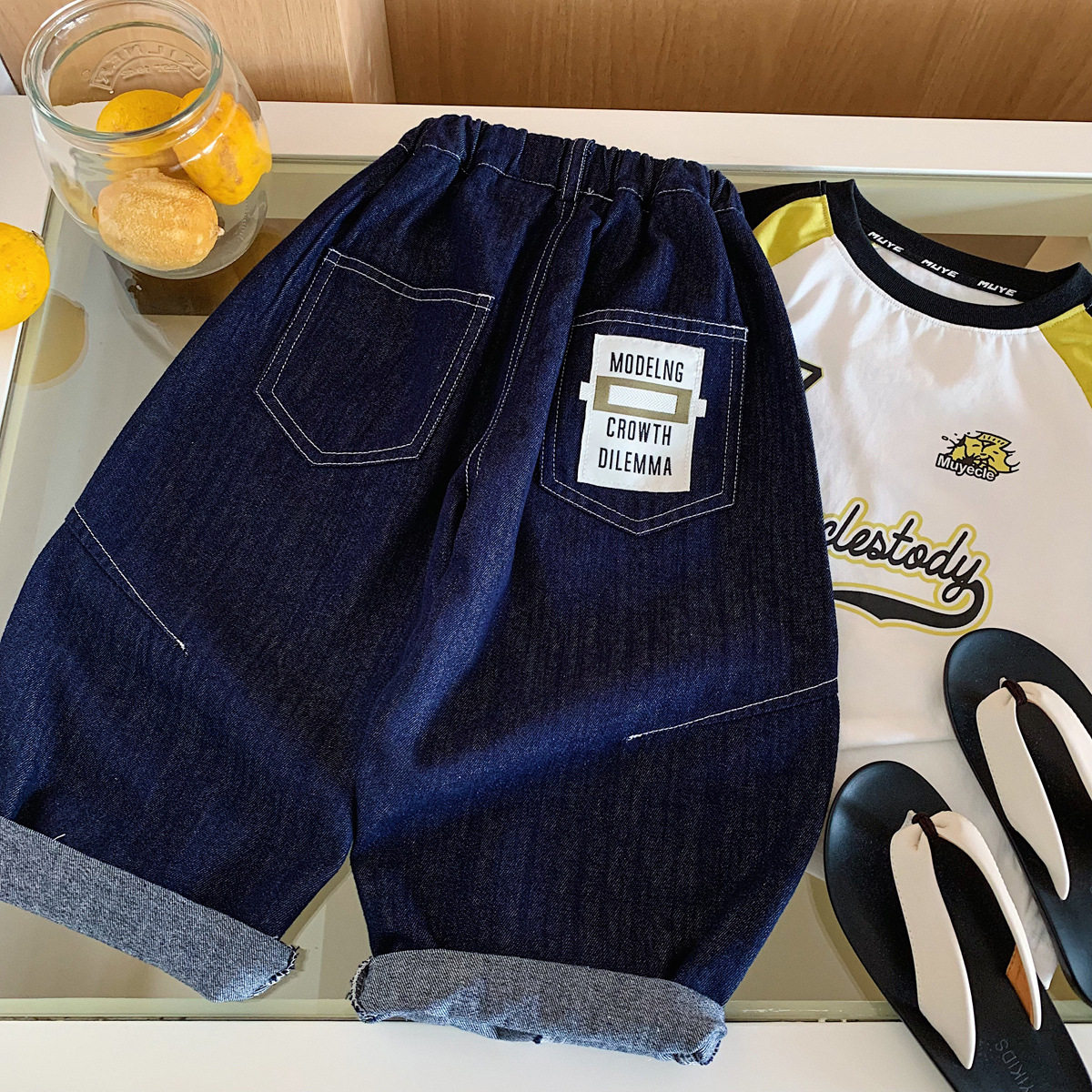 儿童后袋字母标软牛仔七分裤夏季薄款透气百搭男女宝宝休闲裤子潮