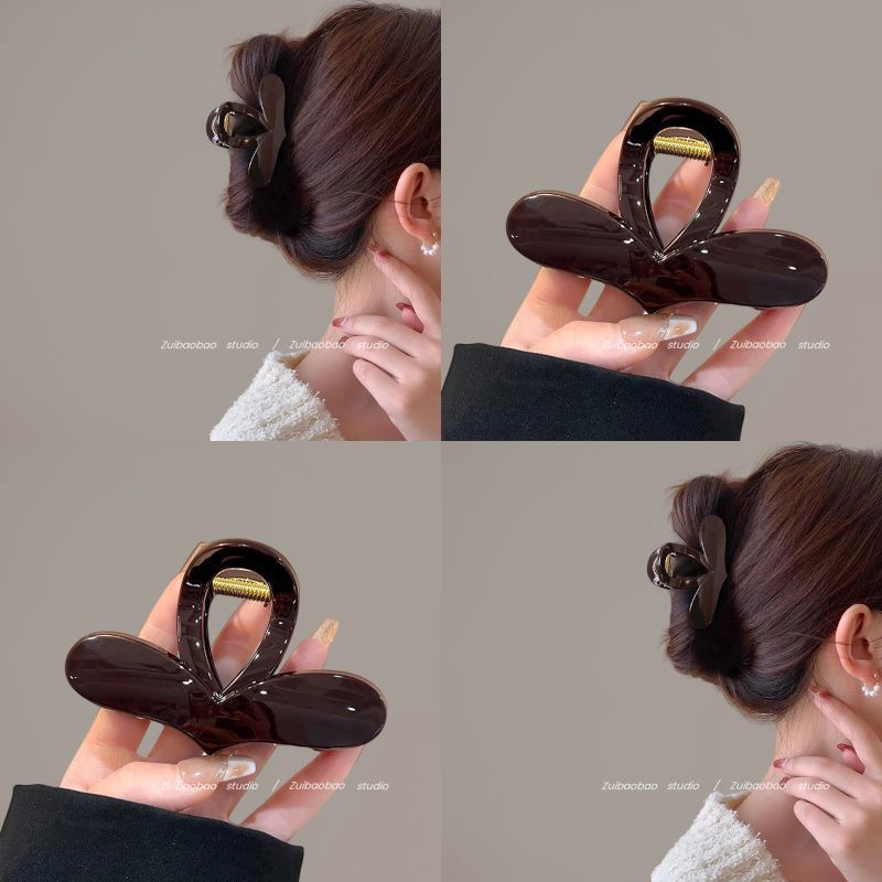 心动讯号咖色氛围感爱心抓夹女高级感2025新款简约盘发鲨鱼夹