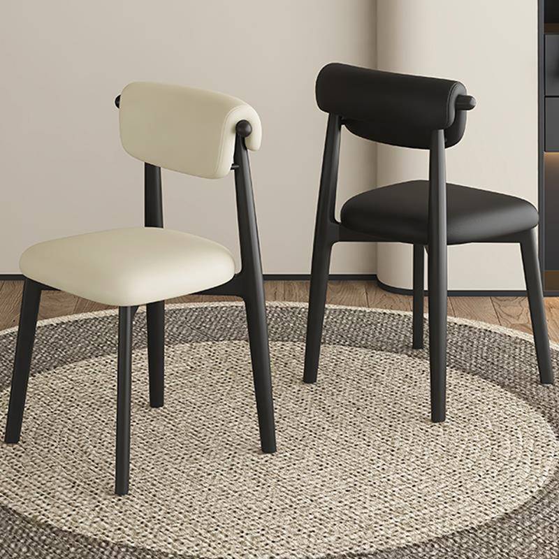 意式极简实木餐椅家用轻奢高级感餐桌椅子黑色真皮靠背椅2025新款