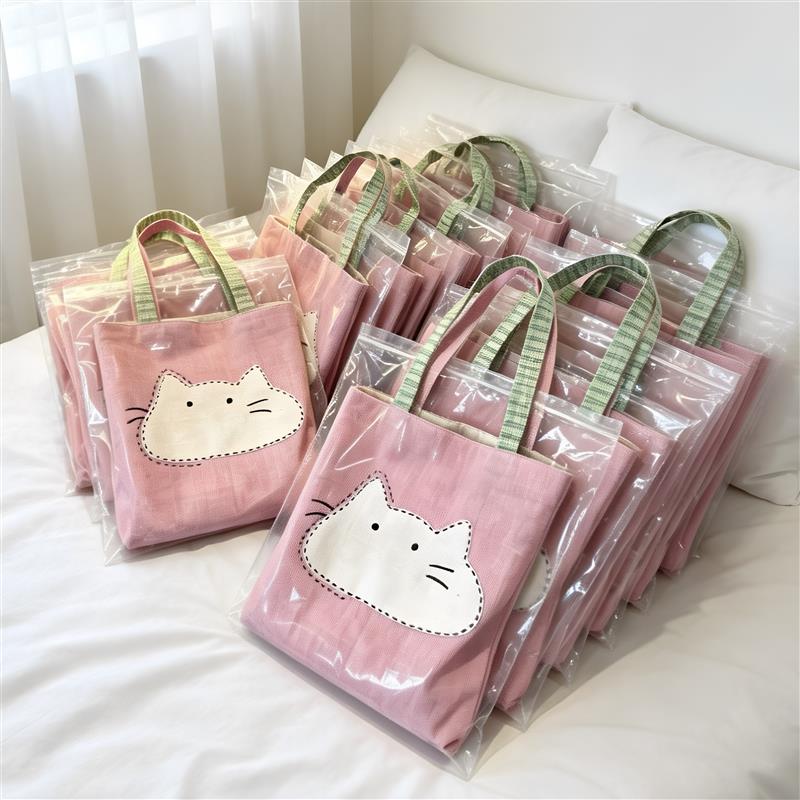 日系猫咪单肩帆布包大容量女生通勤上班杂物小拎包百搭轻便手提包
