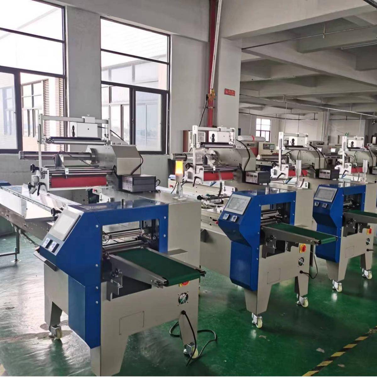 厂家直销回转式枕包机菠萝包包装机面包带托盒包装机