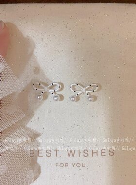 S925纯银白色波点蝴蝶结耳钉
