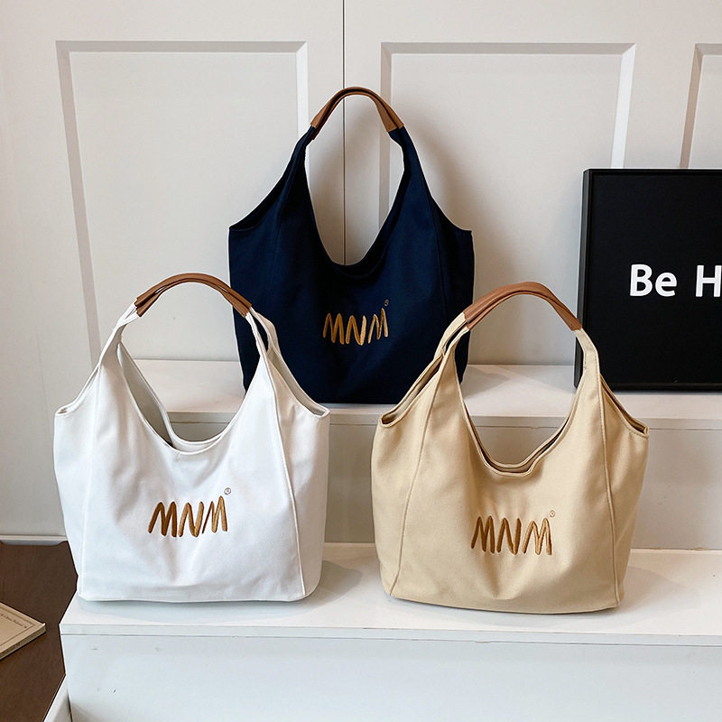 原创设计感手提包新款单肩腋下包大容量通勤帆布包休闲百搭托特包