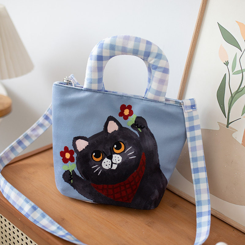卡通帆布女时尚上班通勤包妈咪手提可爱kt猫布包单肩斜跨小布包