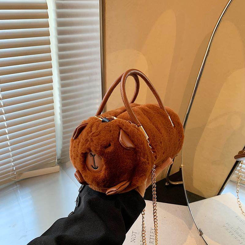 推荐网红毛茸茸可爱小羊斜挎包包女2025新款手提卡通毛绒公仔包毛