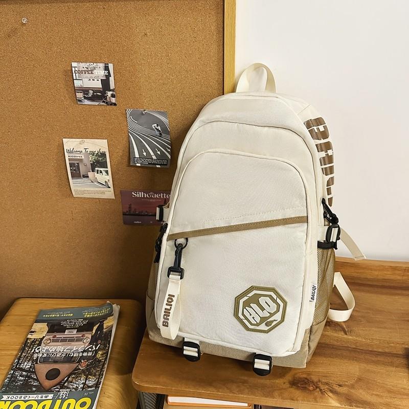 新品双肩包男生初高中大学生轻便减负书包女大容量休闲百搭旅行背