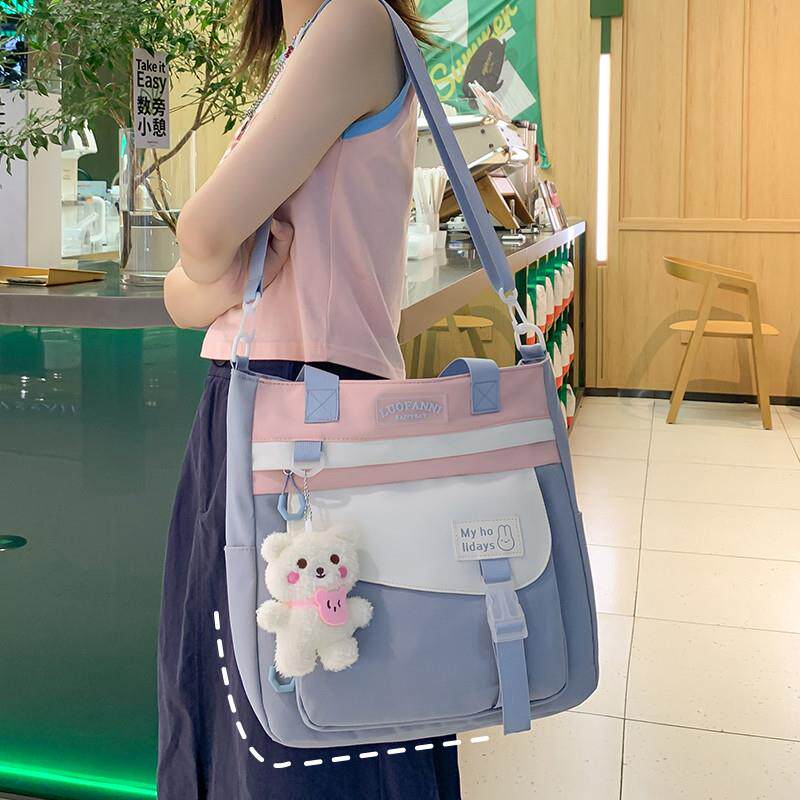 新品斜挎包女初中学生大容量小学生小清新少女可爱手提补习袋单肩