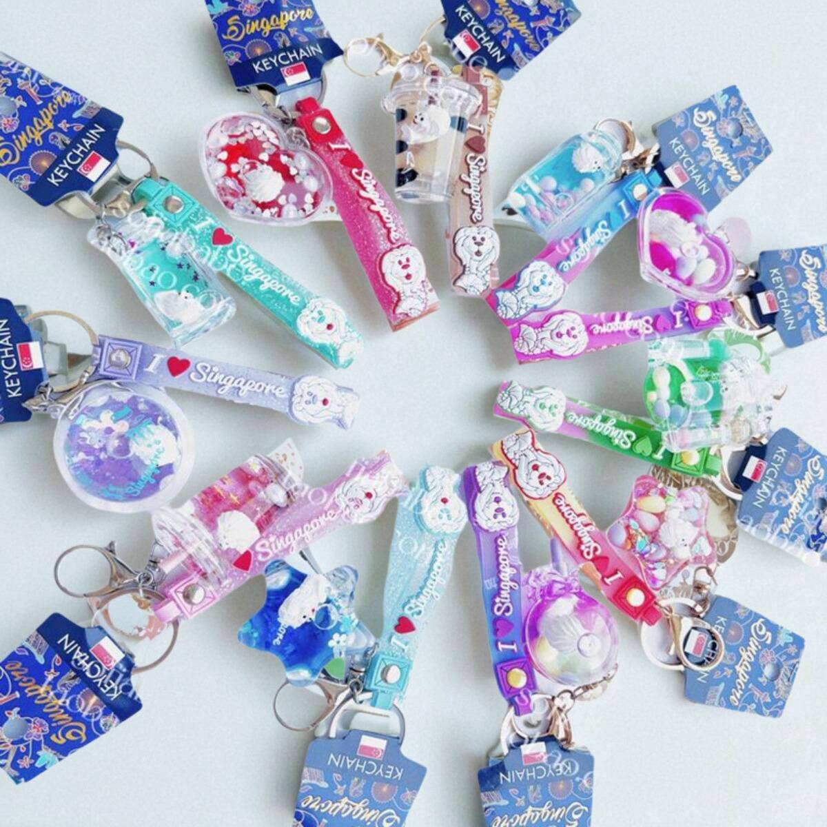 现货新加坡机场旅游纪念品手信流沙漂流瓶漂浮鱼尾狮钥匙扣挂饰