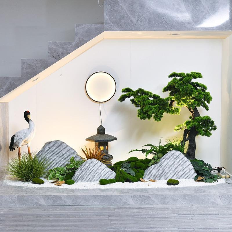 室内楼梯下仿真迎客松雪浪石组合造景酒馆公司玄关过道装饰景观