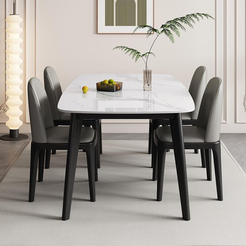 实木岩板餐桌椅组合黑色简约小户型长方形2024新款家用吃饭桌子