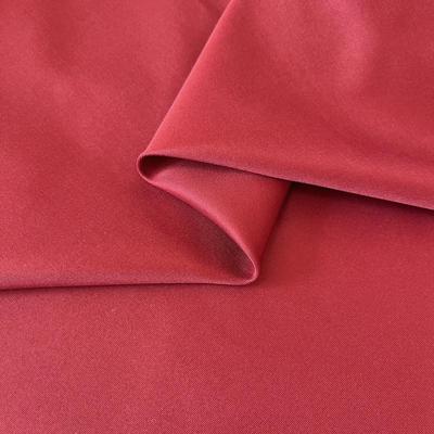 高档纯色斜纹涤纶抗皱风衣布料聚酯纤维面料春秋夹克外套派克服装