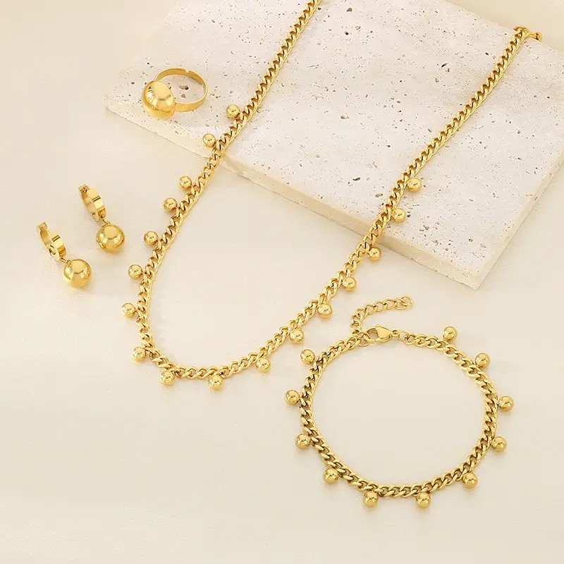 时尚长款流苏光面圆片古巴链链条金色高级感心形钛钢四件套配饰