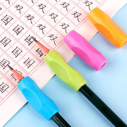 矫正器握笔器小学生幼儿园初学者儿童调整握笔写字神器套头握笔器