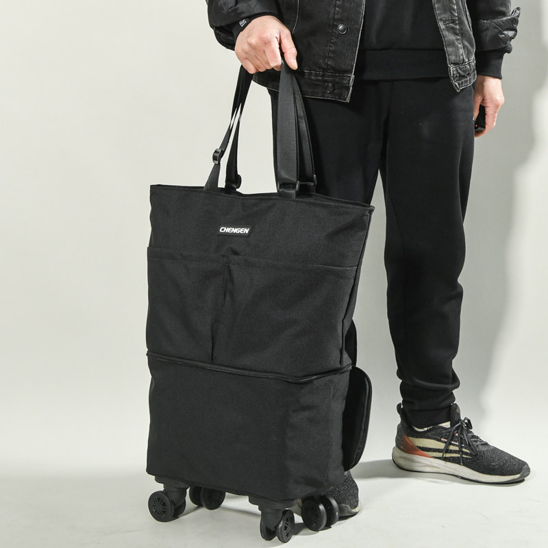 超大容量牛津布万向轮行李包带轮子旅行袋拉O杆包收纳包搬家托运