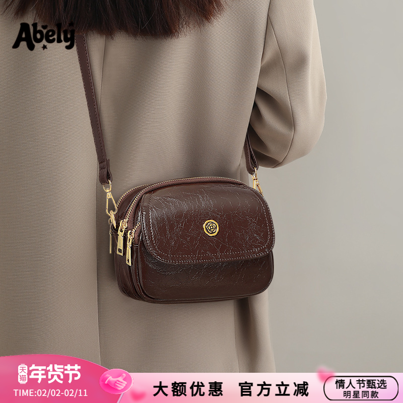 阿贝莉包包女式2026新款女包手机真皮单肩斜挎包高级感通勤小圆包