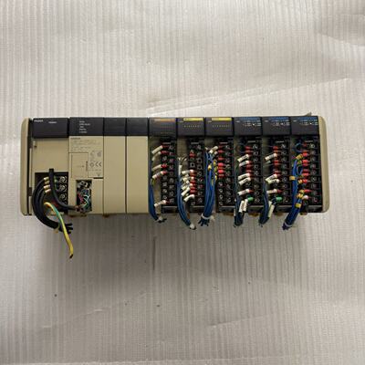 PLC一套，型号CQM1H-CPU21，带PA203电-议价