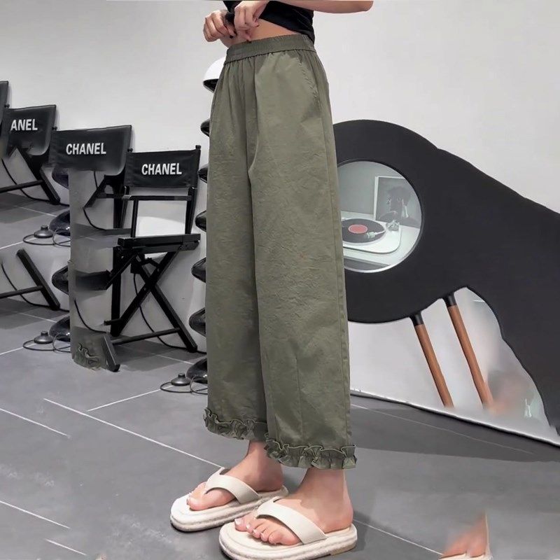 绿色休闲木耳边拼接九分裤女2025夏季新款时尚百搭减龄小众直筒裤