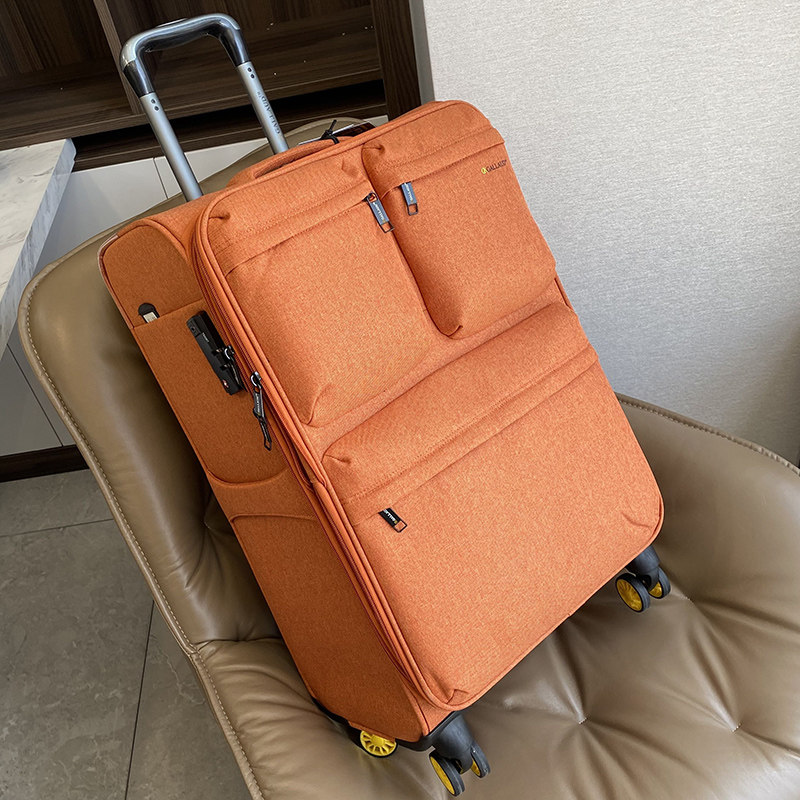 牛津布超轻拉杆箱万向轮帆布行李箱20寸登机旅行24寸密码旅行箱包