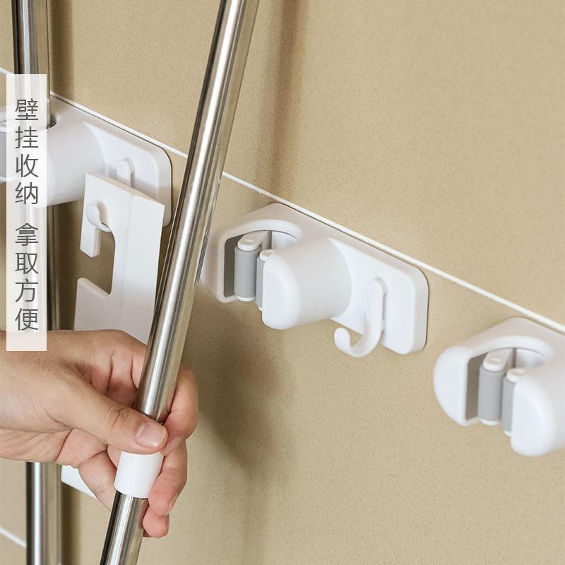 免打孔收纳固定器拖把壁挂夹卫生间浴室墙面扫把固定挂架钩二合一